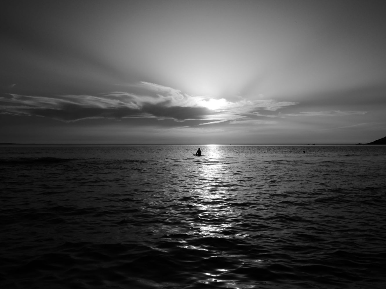 Surfer in the horizon