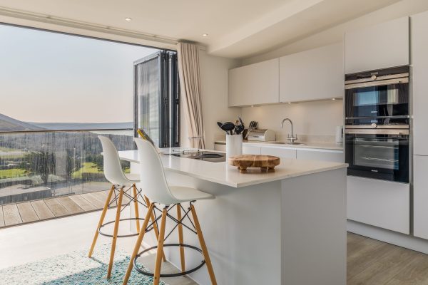 Living room and kitchen with seaviews