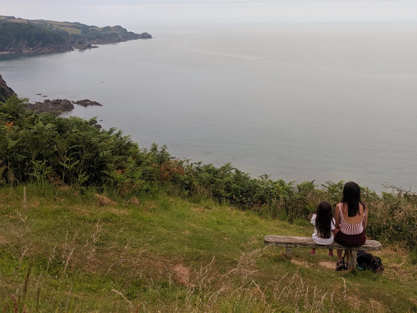 Sat on bench overlooking Wild Pear beach