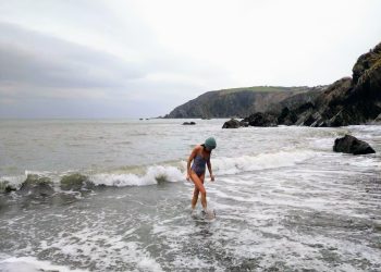 Beach swimming during a solo getaway in North Devon