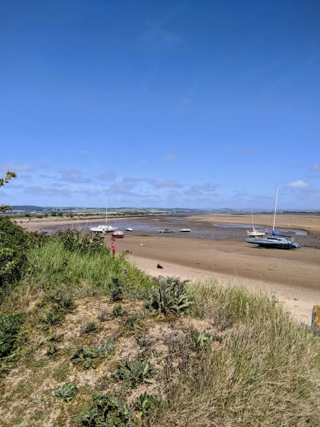 Looking from Crow Point to Instow over a sandy beach with boats