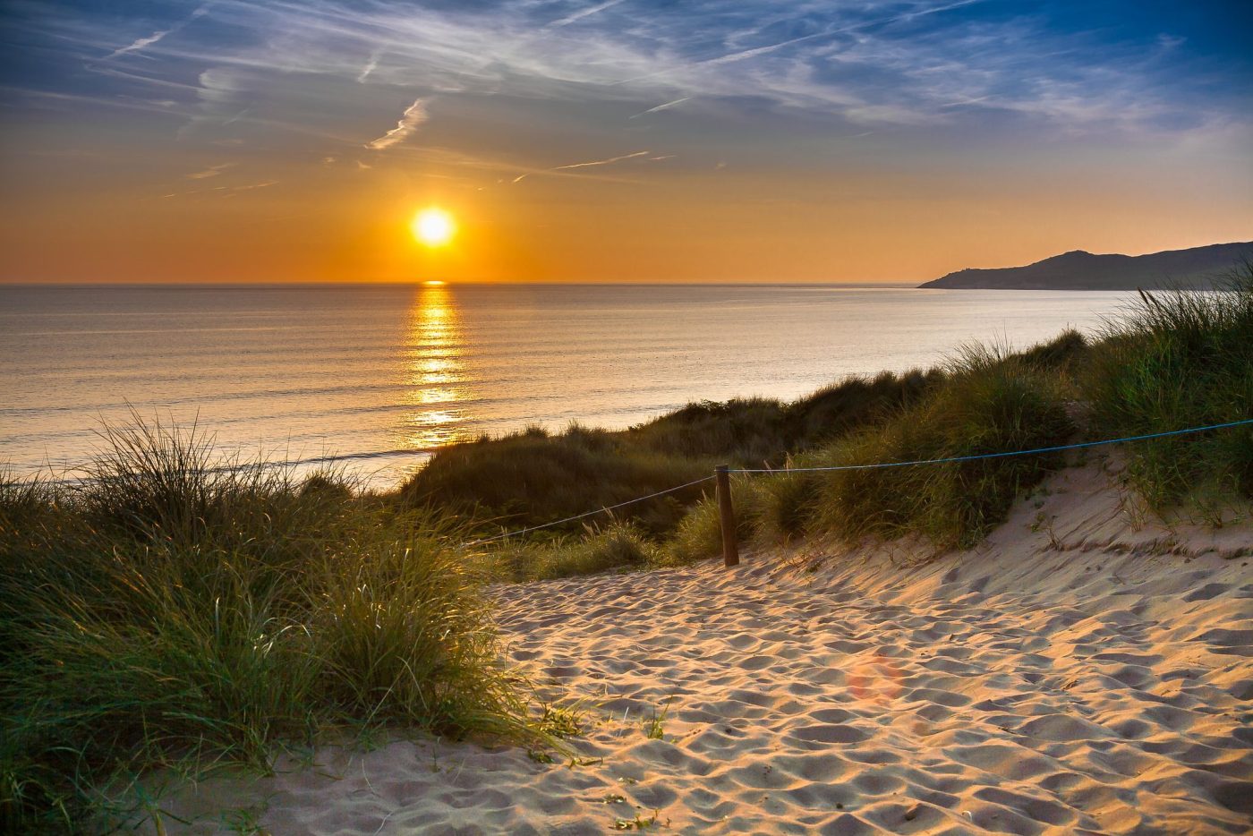 A sandy North Devon beach at sunset